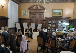 Uczestnicy spotkania podczas wydarzenia, ujęcie z dalszej perspektywy.